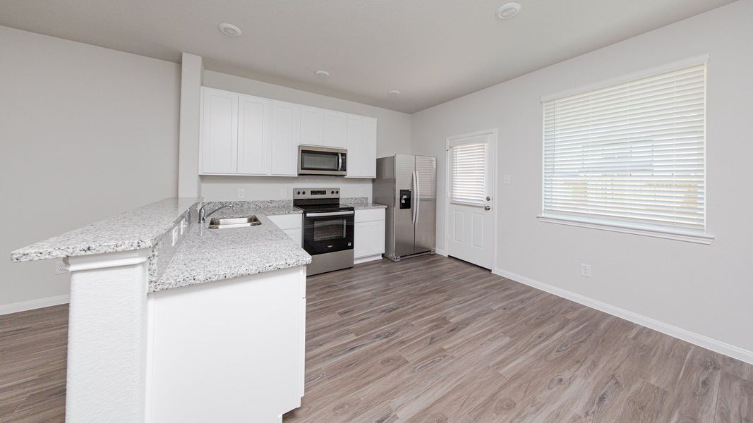 Kitchen and Dining Area Kitchen and Dining Area