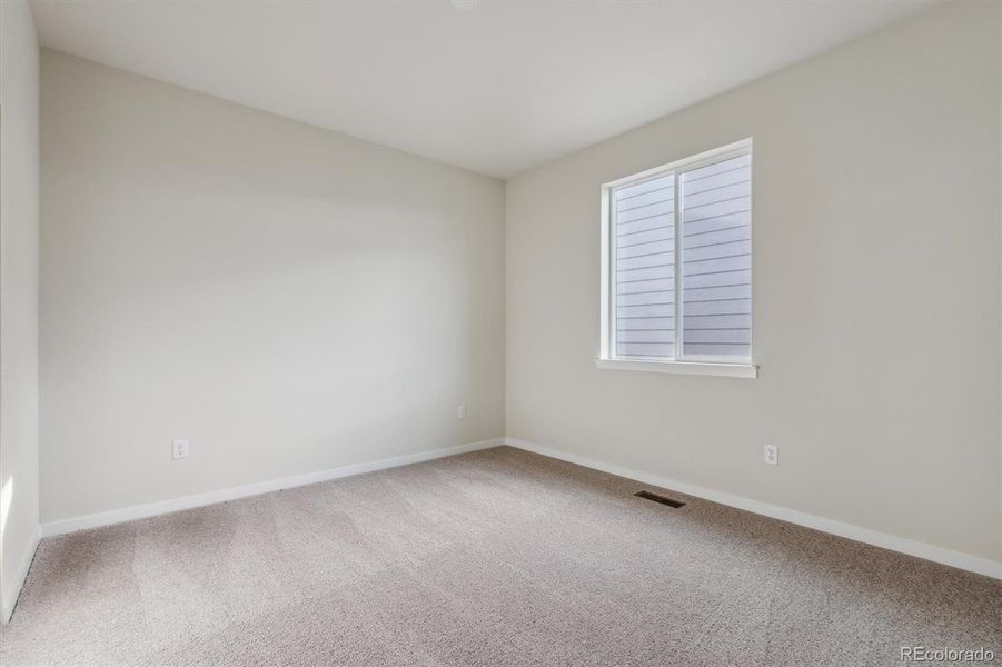 Spacious, unfurnished interior of a new home in Floret Collection at Parkdale Commons, Lafayette (Image 22).