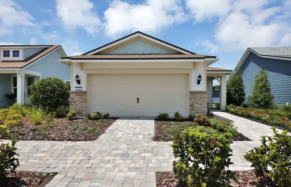 Representative exterior photo of a completed home built from the Contour by Pulte Homes in Seminole Palms, Palm Coast, FL (Image 25).