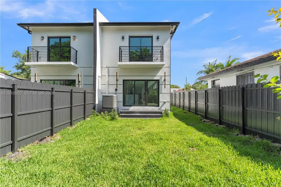 Exterior details and patio area of a home in , Miami (Image 3).
