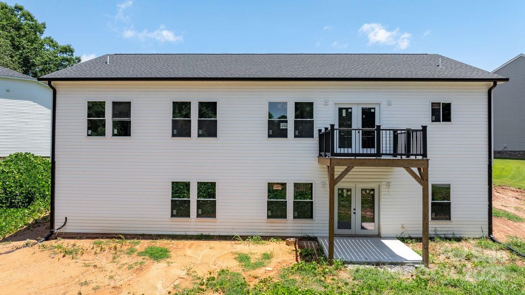 Front exterior of a new home in , Claremont, NC, highlighting curb appeal (Image 13).