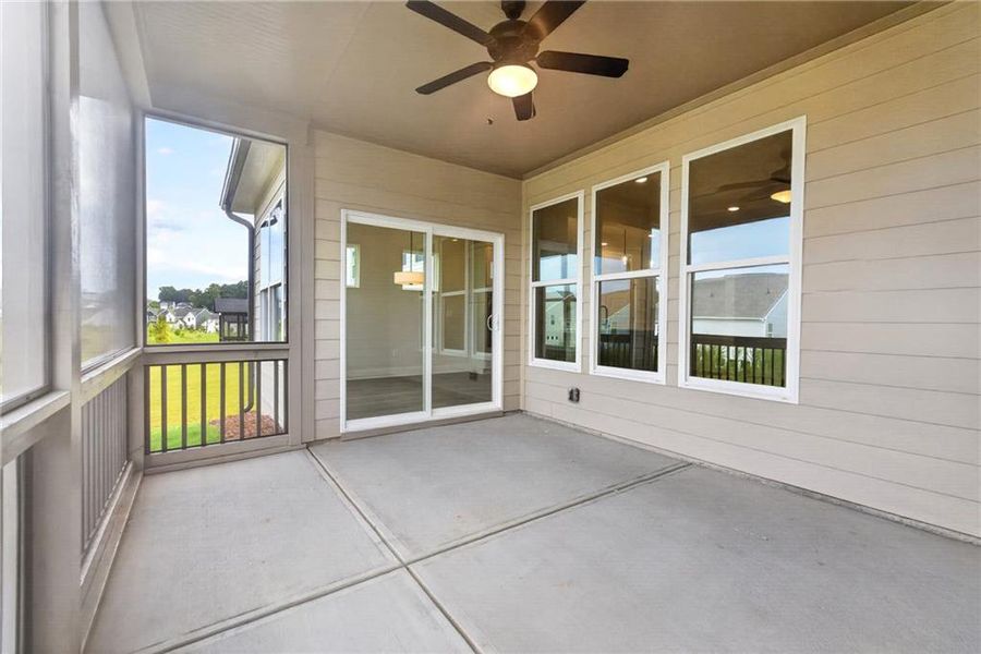 Exterior details and patio area of a home in Twin Lakes, Hoschton (Image 21).