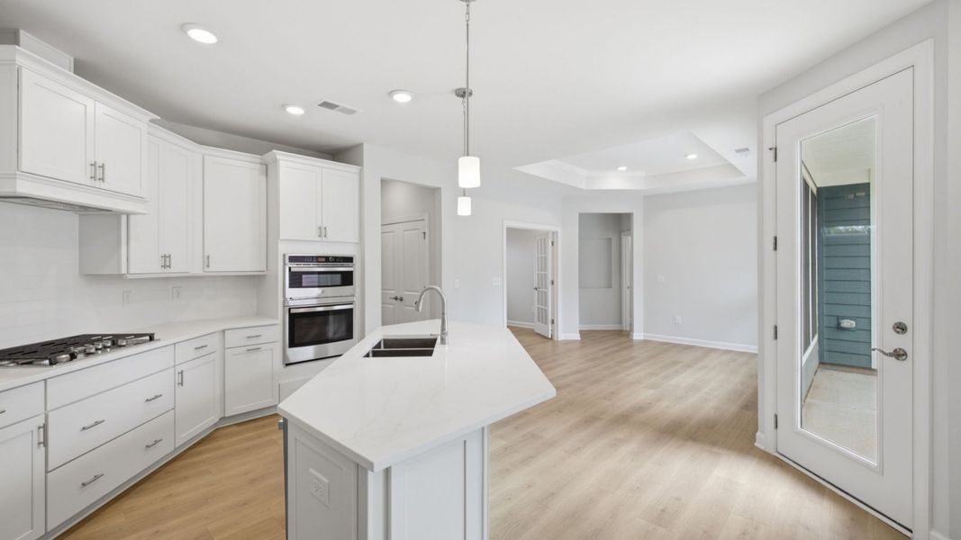 Furnished interior view inside a new home in The Courtyards at Oak Grove, Durham (Image 11).