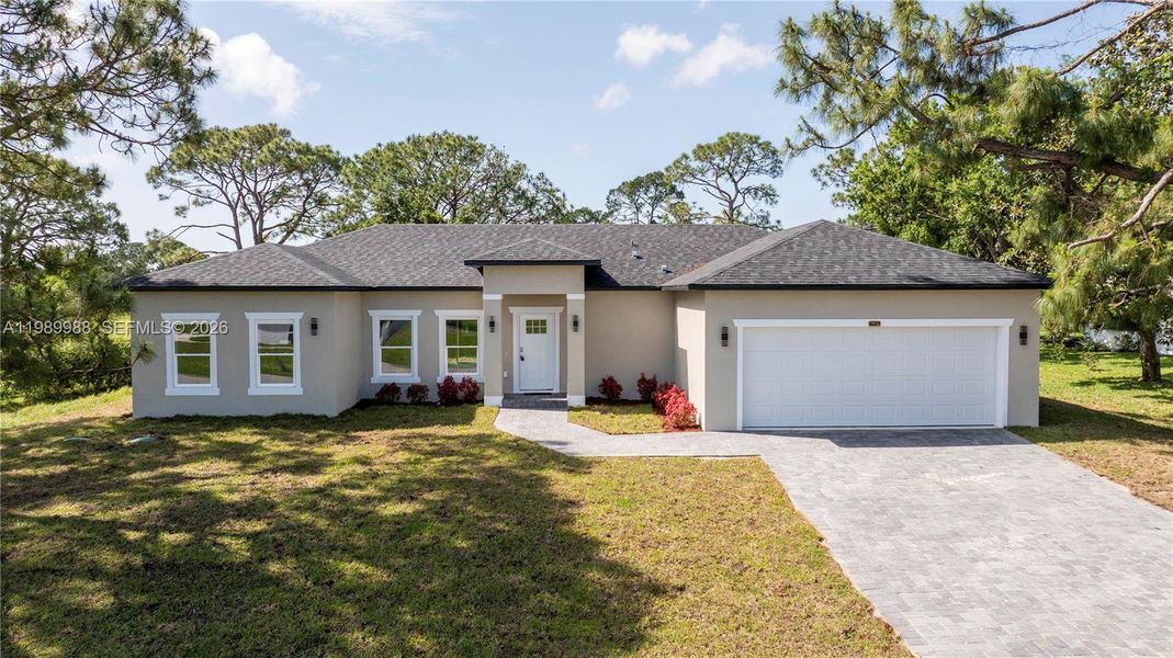 Front exterior of a new home in , Sebring, FL, highlighting curb appeal (Image 31).