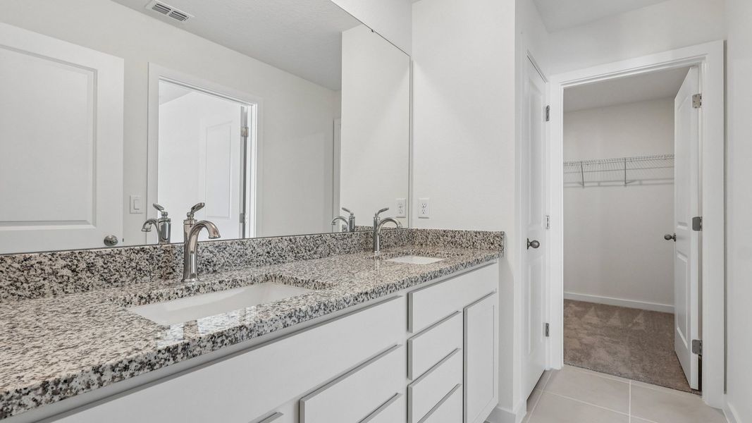 Furnished interior view inside a new home in Cyrene at Harmony, St. Cloud (Image 31).
