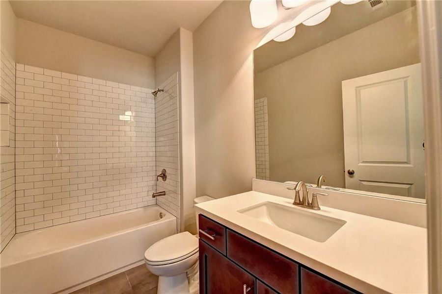 Furnished interior view inside a new home in Bellmoore Park, Duluth (Image 6).