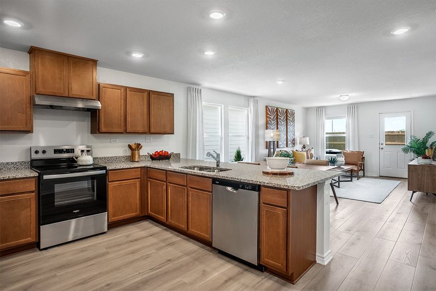 Representative furnished interior of a home built from the 1245 Modeled by KB Home in Medina Crossing - Villa Collection, Von Ormy (Image 8).