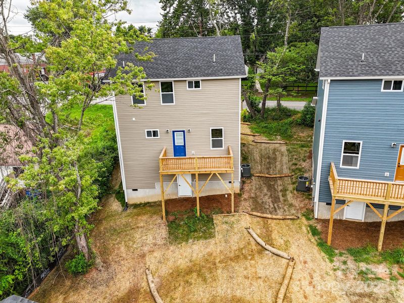Front exterior of a new home in , Asheville, NC, highlighting curb appeal (Image 21).