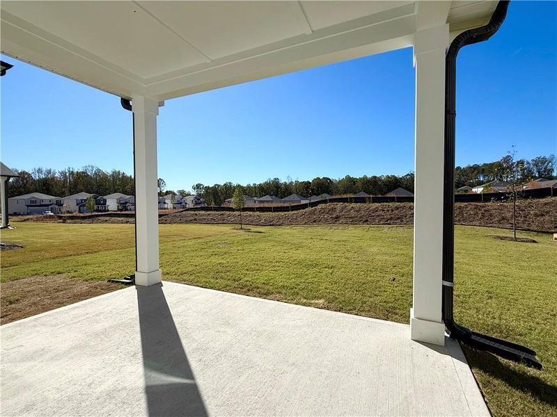 Exterior details and patio area of a home in Vines at Mill Creek - Estate Series, Braselton (Image 18). Exterior details and patio area of a home in Vines at Mill Creek - Estate Series, Braselton (Image 18).