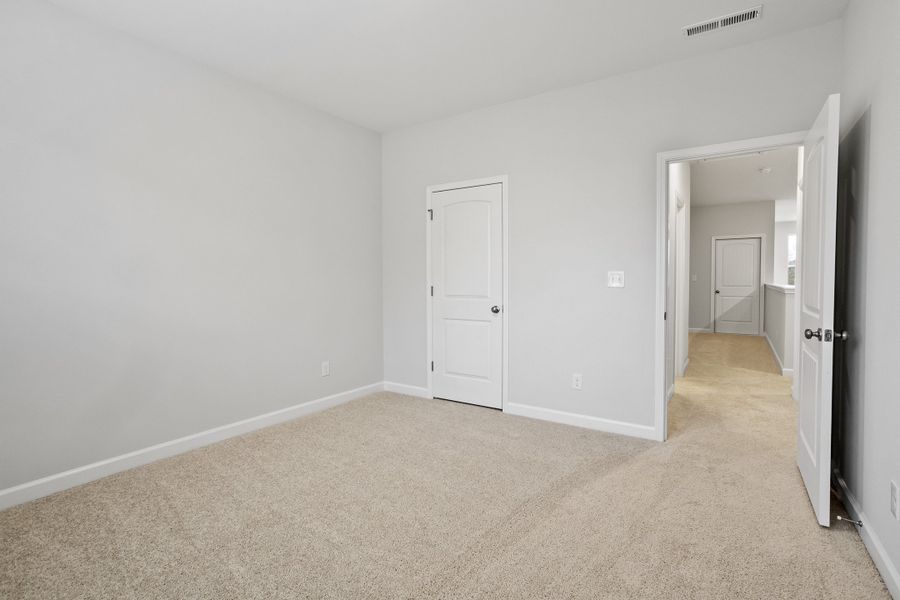 Spacious, unfurnished interior of a new home in Ovation at Sweetbrier, Durham (Image 26).