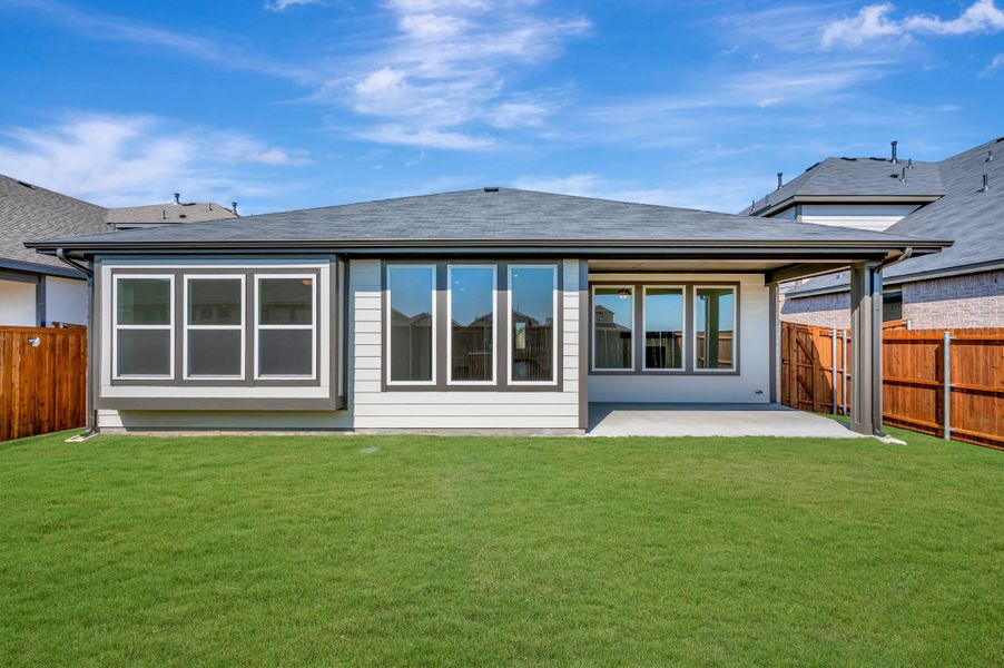 Exterior details and patio area of a home in The Meadows, Denton (Image 17).