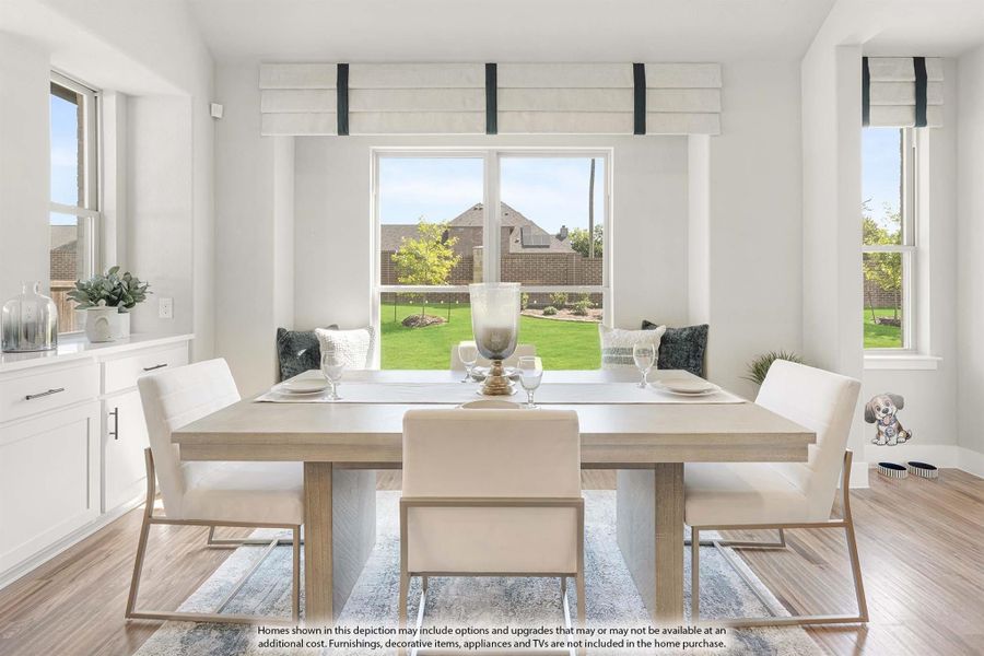 Bright dining room with wood table, white chairs, hardwood floors, and large windows overlooking a backyard.