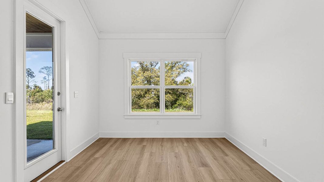 Representative unfurnished interior of a home built from the The Lily by D.R. Horton in WindMark Beach, Port Saint Joe (Image 24).