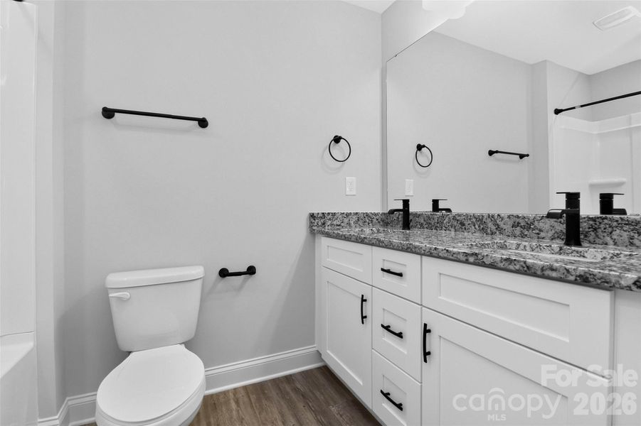 Furnished interior view inside a new home in , Belmont (Image 17).