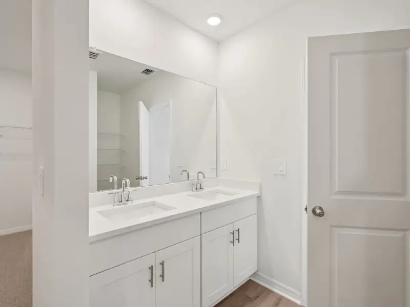Furnished interior view inside a new home in The Reserve at Van Oaks, Auburndale (Image 4).