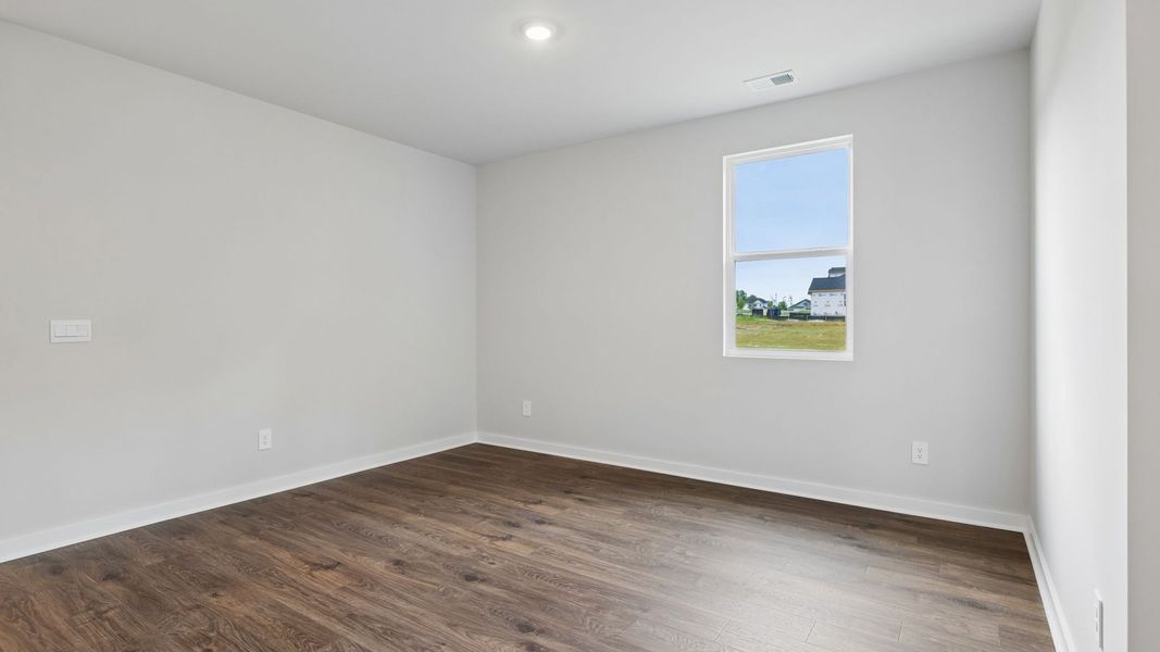 Representative unfurnished interior of a home built from the Holden by D.R. Horton in Harvest Point, Spring Hill (Image 59).