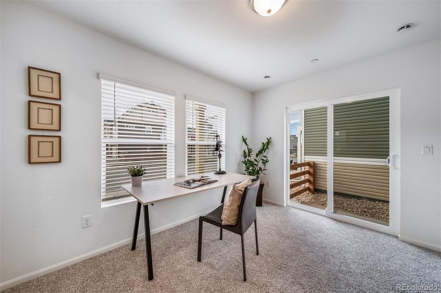 Furnished interior view inside a new home in Reunion, Commerce City (Image 6).