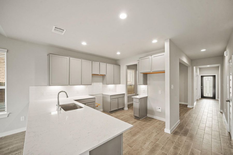 Furnished interior view inside a new home in Sunterra North, Katy (Image 5). Furnished interior view inside a new home in Sunterra North, Katy (Image 5).