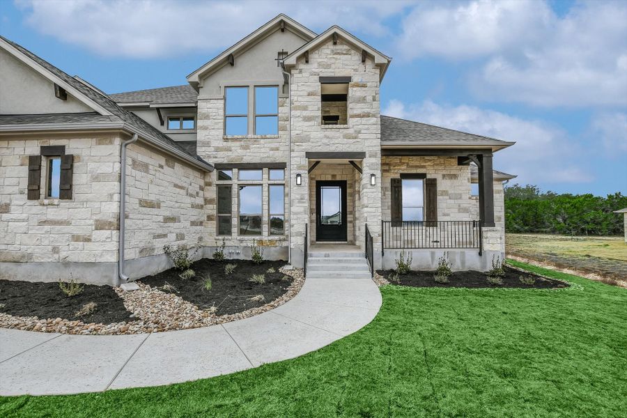 Representative exterior photo of a completed home built from the Madera II by Giddens Homes in Scofield Farms Estates, Georgetown, TX (Image 65).