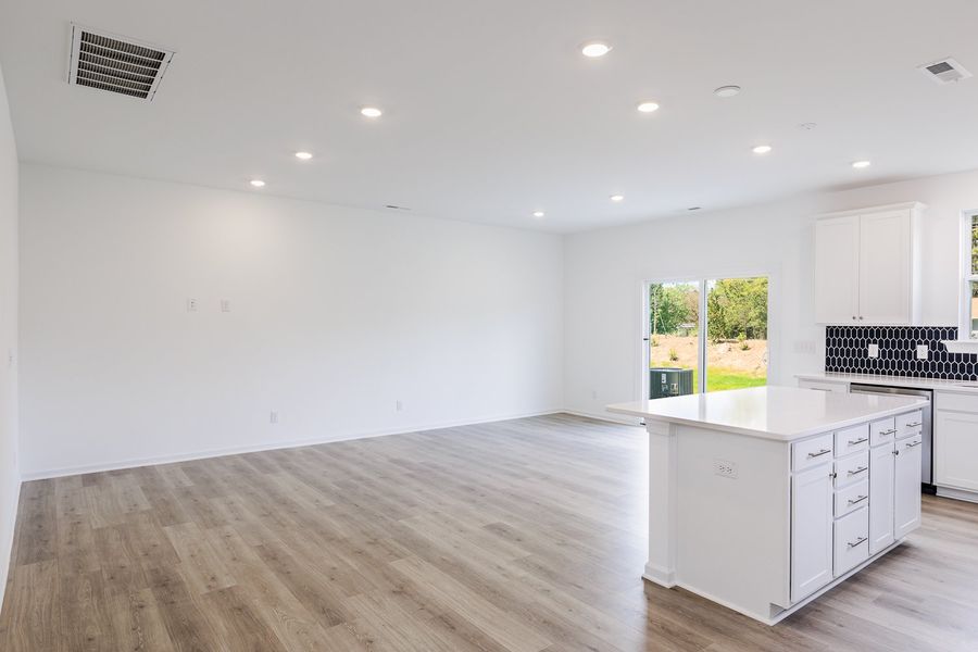 Representative unfurnished interior of a home built from the Willow by Taylor Morrison in Forestville Station, Wake Forest (Image 20).