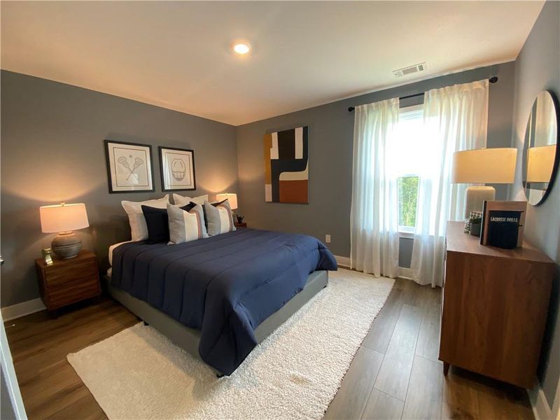 Furnished interior view inside a new home in Estates at Yellow Creek, Cumming (Image 15). Furnished interior view inside a new home in Estates at Yellow Creek, Cumming (Image 15).