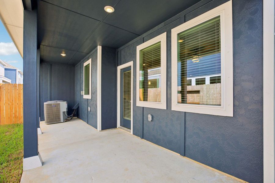 Exterior details and patio area of a home in Kemah Crossing - City Series, Kemah (Image 3). Exterior details and patio area of a home in Kemah Crossing - City Series, Kemah (Image 3).