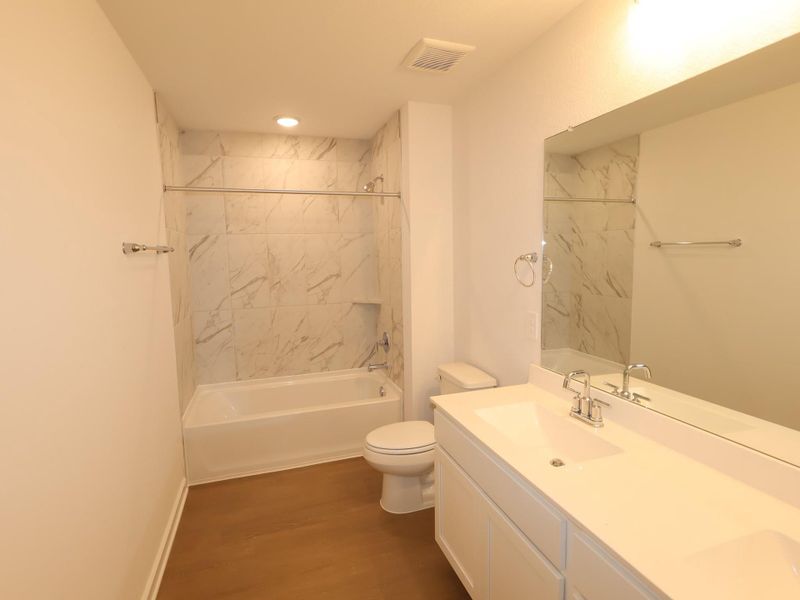 Furnished interior view inside a new home in Sorella, Tomball (Image 6).