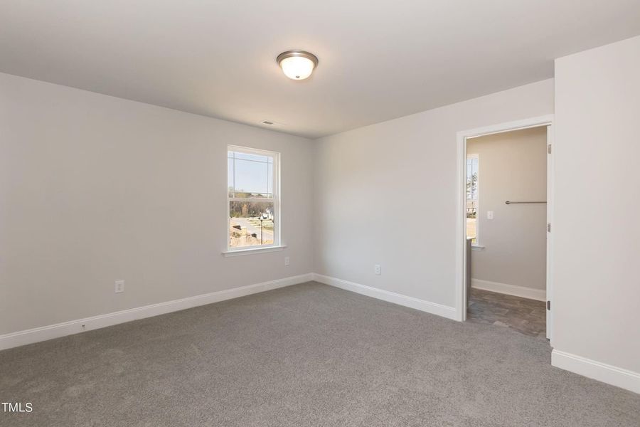 Representative unfurnished interior of a home built from the 2721 by Adams Homes in Hidden Pines, Cameron (Image 29).