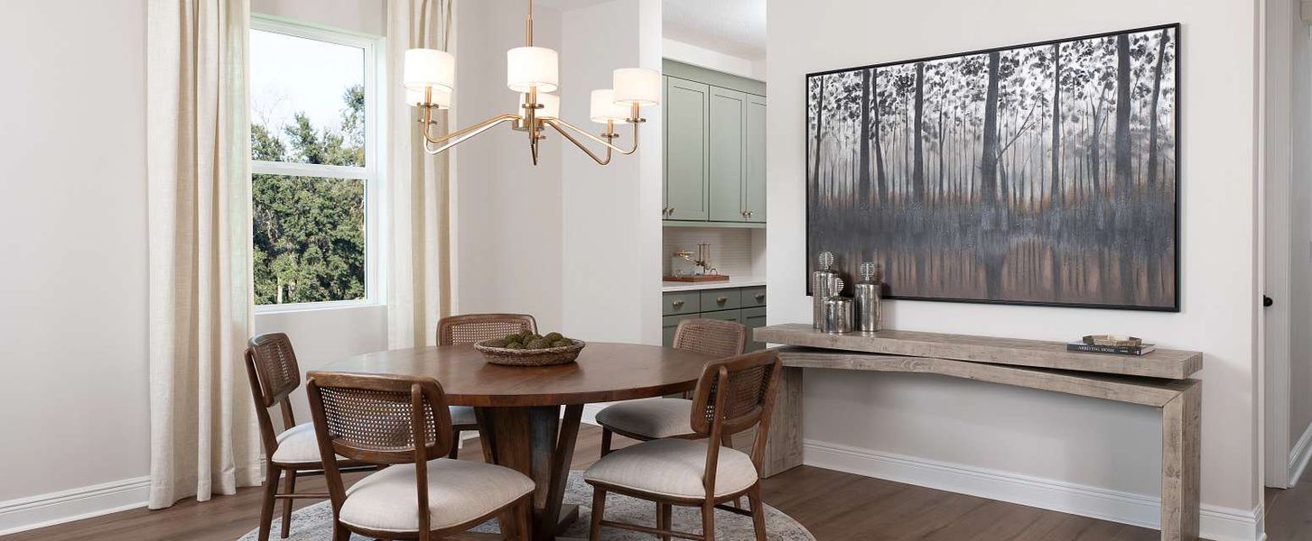 Representative furnished interior of a home built from the Griffin by Ashton Woods in Lake Cawood Cove, Windermere (Image 10).