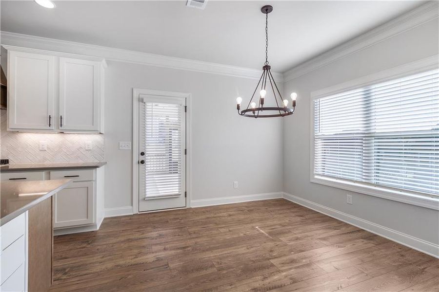 Spacious, unfurnished interior of a new home in Calgary Downs, Winder (Image 18).