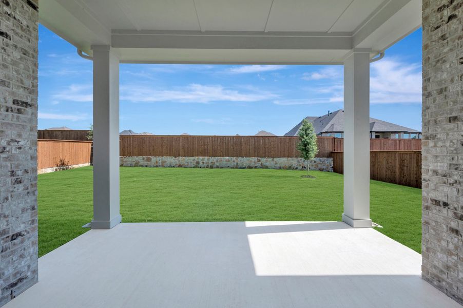 Exterior details and patio area of a home in Monterra - Classics, Fate (Image 3).