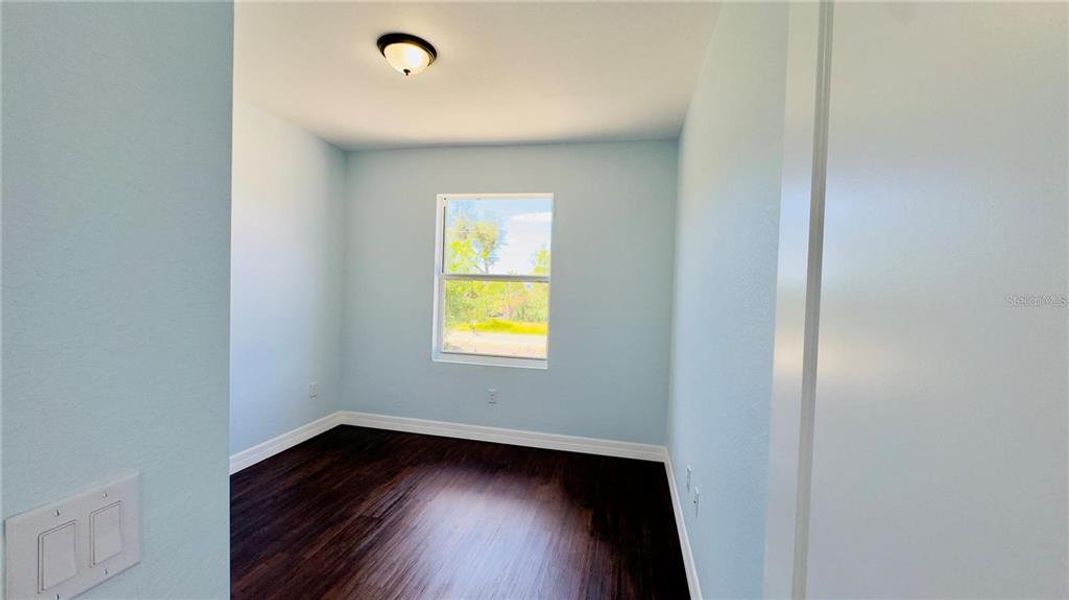 Spacious, unfurnished interior of a new home in , Port Charlotte (Image 10).