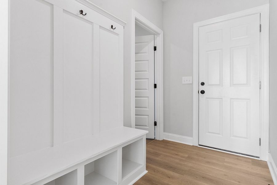 Representative furnished interior of a home built from the The Chandler by RobuckHomes in Windwater, Hampstead (Image 17).