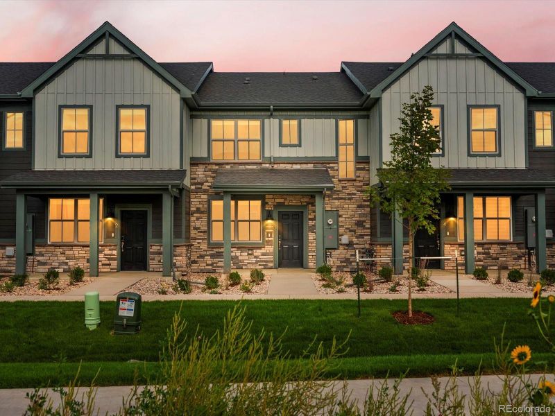 Front exterior of a new home in Poudre Heights: The Meadow Collection, Windsor, CO, highlighting curb appeal (Image 2).