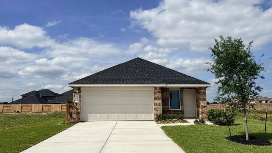 Front exterior of a new home in Cypress Green, Tomball, TX, highlighting curb appeal (Image 1). Front exterior of a new home in Cypress Green, Tomball, TX, highlighting curb appeal (Image 1).