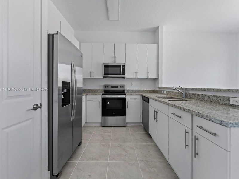 Furnished interior view inside a new home in , Homestead (Image 6).