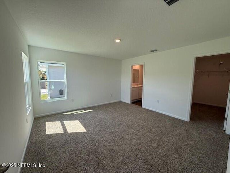 Spacious, unfurnished interior of a new home in Grand Reserve, Bunnell (Image 26).