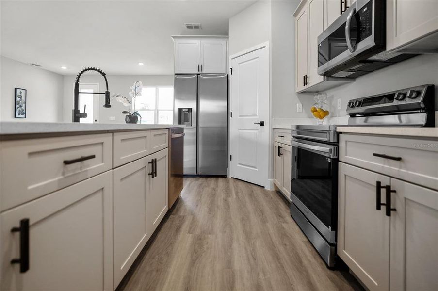 Furnished interior view inside a new home in , Kissimmee (Image 8).