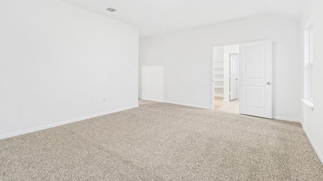 Spacious, unfurnished interior of a new home in Bar W Ranch, Leander (Image 31).