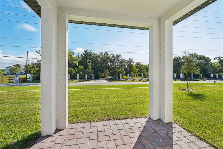 Exterior details and patio area of a home in The Meadow at Crossprairie, St. Cloud (Image 19).