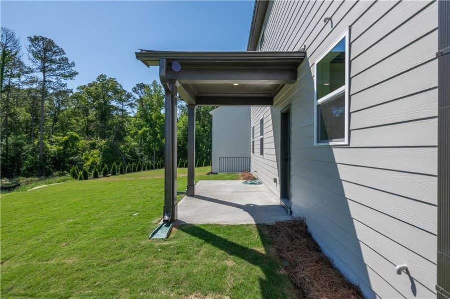 Exterior details and patio area of a home in Cambridge at Steels Bridge, Canton (Image 2). Exterior details and patio area of a home in Cambridge at Steels Bridge, Canton (Image 2).