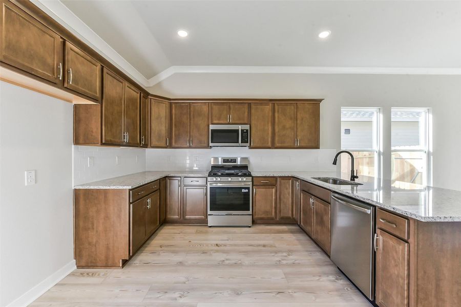 Furnished interior view inside a new home in Aldeana, Bonney (Image 11).