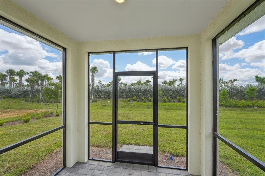 Exterior details and patio area of a home in Crescent Lakes - Premier Series, Punta Gorda (Image 17).