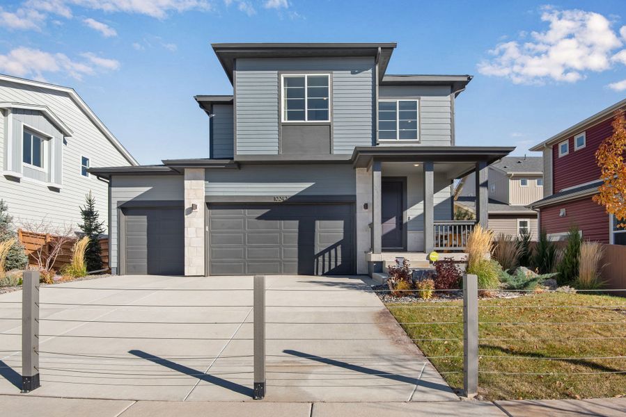 Representative exterior photo of a completed home built from the The Sonata by Tri Pointe Homes in Reunion, Commerce City, CO (Image 1). Representative exterior photo of a completed home built from the The Sonata by Tri Pointe Homes in Reunion, Commerce City, CO (Image 1).