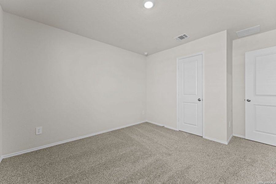 Spacious, unfurnished interior of a new home in Navarro Fields, Seguin (Image 24).