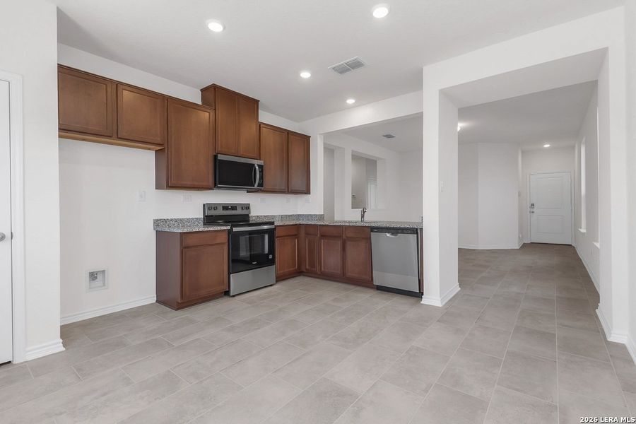Furnished interior view inside a new home in The Granary - Heritage Collection, San Antonio (Image 4).