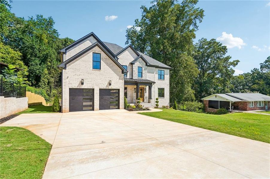 Front exterior of a new home in , Buford, GA, highlighting curb appeal (Image 25).