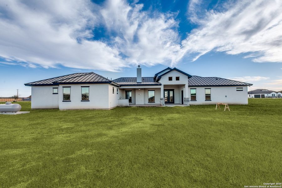Exterior details and patio area of a home in , Castroville (Image 3).