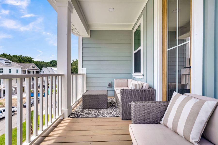 Exterior details and patio area of a home in Overlook at Copahee Sound, Awendaw (Image 30).