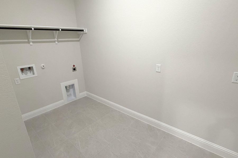Washroom featuring gas dryer hookup, hookup for an electric dryer, and washer hookup
